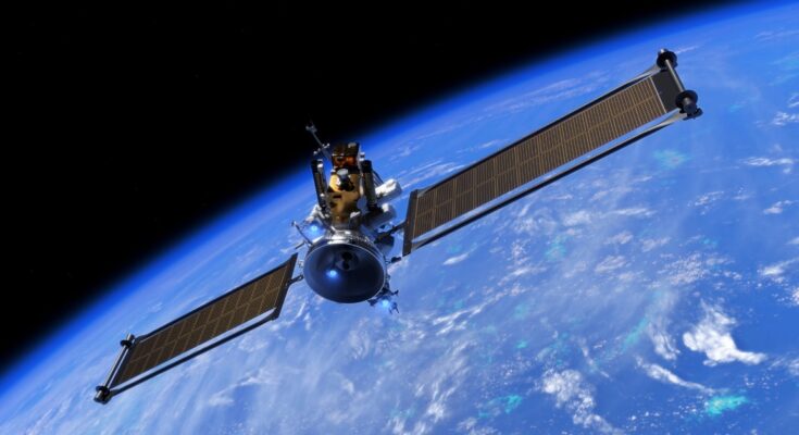 a cube-shaped spacecraft with two long wing-like solar panels in orbit above earth