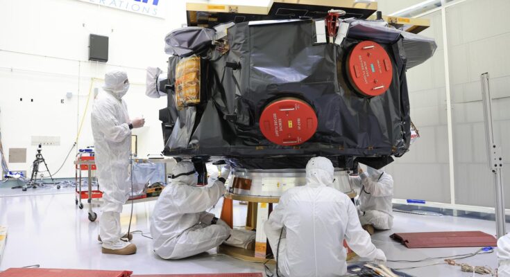 Technicians conduct blanket closeout work on NASA’s IMAP (Interstellar Mapping and Acceleration Probe) observatory at the Astrotech Space Operations Facility near NASA’s Kennedy Space Center in Florida on Friday, Aug. 15, 2025. The IMAP mission will explore and map the boundaries of the heliosphere — a huge bubble created by the Sun’s wind that encapsulates our entire solar system — and study how the heliosphere interacts with the local galactic neighborhood beyond.
