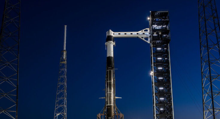 A SpaceX Falcon 9 rocket, with the company’s Dragon spacecraft, stands in a vertical position at Space Launch Complex 40 at Cape Canaveral Space Force Station in Florida on Tuesday, March 19, 2024