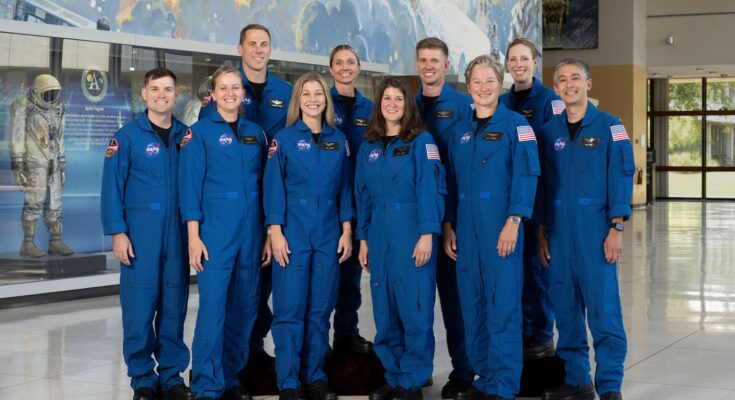In this photo provided by NASA, NASA's 10 newest astronauts, from front left: US Army CW3 Ben Bailey, Rebecca Lawler, Anna Menon, Dr. Lauren Edgar, USNavy Lt. Cmdr. Erin Overcash, Yuri Kubo, and US Air Force Maj. From back left: Cameron Jones,Katherine Spies, US Air Force Maj. Adam Fuhrmann and Dr. Imelda Muller.