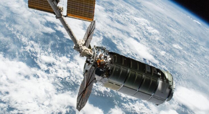 Northrop Grumman's Cygnus XL cargo craft, carrying over 11,000 pounds of new science and supplies for the Expedition 73 crew, is pictured in the grips of the International Space Station's Canadarm2 robotic arm following its capture. Both spacecraft were orbiting 257 miles above Tanzania. Cygnus XL is Northrop Grumman's expanded version of its previous Cygnus cargo craft increasing its payload capacity and pressurized cargo volume.