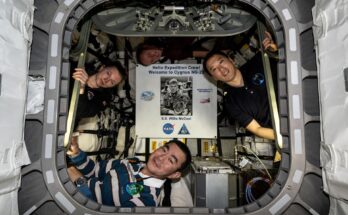 Pictured inside the Northrop Grumman Cygnus XL cargo craft are (clockwise from left) Flight Engineers Zena Cardman, Mike Fincke, and Jonny Kim of NASA, and Flight Engineer Kimiya Yui of JAXA (Japan Aerospace Exploration Agency). Highlighted at center, is a poster of William “Willie” McCool, in honor of the NASA astronaut who perished in 2003 during the space shuttle Columbia accident and for whom the Cygnus spacecraft is named.