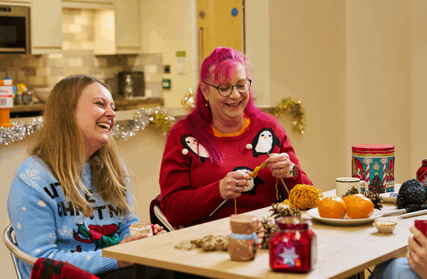 Two women celebrating the holidays