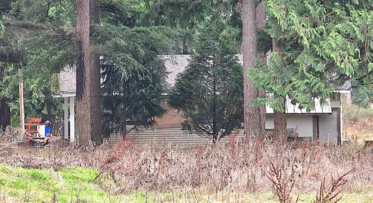 Owners of this unoccupied house in the 19900-block of 30 Ave. in Brookswood said squatters caused a fire Saturday morning. (Dan Ferguson/Langley Advance Times)