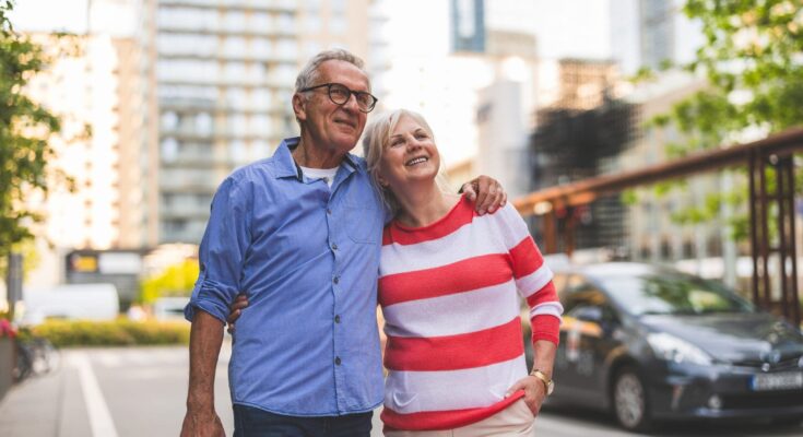 Senior couple in love walking in the city