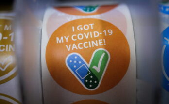 Children receive the coronavirus disease (COVID-19) vaccine at Skippack Pharmacy in Schwenksville